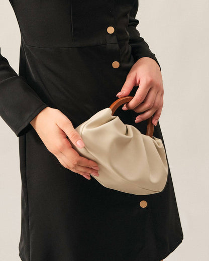 Sac à main plissé avec poignée en bois