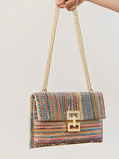 Sac à bandoulière tissé avec chaîne et fermoir tournant