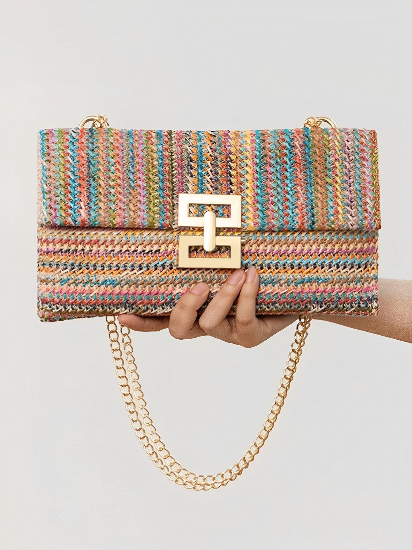 Sac à bandoulière tissé avec chaîne et fermoir tournant